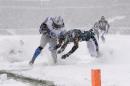 Detroit Lions' Joique Bell, left, is tackled by Philadelphia Eagles' Bradley Fletcher during the first half of an NFL football game, Sunday, Dec. 8, 2013, in Philadelphia. (AP Photo/Michael Perez)