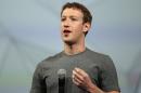 Facebook CEO Mark Zuckerberg delivers the opening kenote at the Facebook f8 conference in San Francisco on April 30, 2014