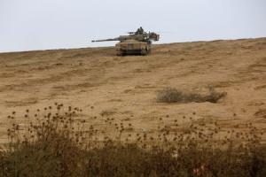 An Israeli tank is seen near the Israeli border with &hellip;