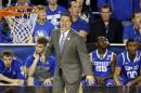 Kentucky head coach John Calipari works from the sideline against Wisconsin during the second half of the NCAA Final Four tournament college basketball semifinal game Saturday, April 5, 2014, in Arlington, Texas. Kentucky won 74-73. (AP Photo/Tony Gutierrez)