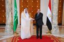 Saudi King Salman (left) shakes hands with Egyptian President Abdel Fattah al-Sisi during talks in Cairo, on April 7, 2016