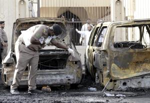 Policeman carries out an inspection after a car exploded &hellip;