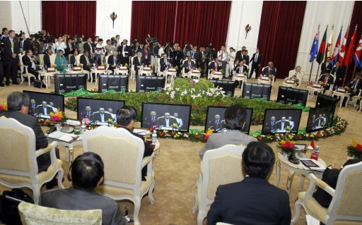Cambodia's Foreign Minister Hor Namhong is seen on TV screens while speaking at the 19th ASEAN Regional Forum (ARF) Foreign Ministers Retreat at the office of the Council of Ministers in Phnom Penh