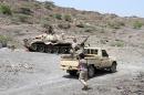 Yemeni pro-government forces fire toward Huthi rebels positioned in the hills of the Sharija region on the borders of Taez and Lahj provinces on September 25, 2016