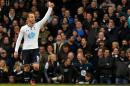 Tottenham Hotspur's Spanish striker Roberto Soldado celebrates scoring the opening goal of the English Premier League football match between Tottenham Hotspur and Cardiff City at White Hart Lane in north London on March 2, 2014