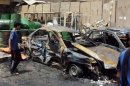 The damage caused by a car bomb in Sadr City in May. Twin blasts went off in the Baghdad neighbourhood Friday