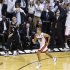 Heat's Battier reacts after hitting a three point basket over Spurs' Green during Game 7 of their NBA Finals basketball playoff in Miami