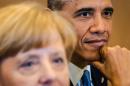 German Chancellor Angela Merkel, left, and U.S. President Barack Obama attend the first working session at a G7 summit in Brussels on Wednesday, June 4, 2014. The leaders of the Group of Seven are participating in a two day meeting in which they will discuss among other issues, the situation in Ukraine. (AP Photo/Geert Vanden Wijngaert)