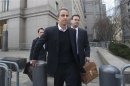 Michael Steinberg (C) leaves Manhattan Federal Court in New York