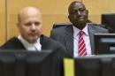 This picture taken on September 10, 2013 shows Kenya's Deputy President William Ruto (R) in the courtroom at the International Criminal Court (ICC) in The Hague