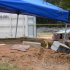 In this undated photo released by the FBI on Tuesday, Feb. 5, 2013, a tent covers the bunker where where a 5-year-old child was held for a week by Jimmy Lee Dykes in Midland City, Ala. The boy was rescued and his captor was killed when federal agents raided the bunker on Monday. (AP Photo/FBI)