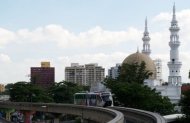 A mono rail train makes its way to downtown Kuala Lumpur in May. Malaysia's economy grew a faster than expected 5.4% in the second quarter as robust domestic demand helped offset the impact of the global economic woes, the government said Wednesday