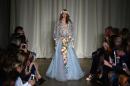A model presents a creation by Marchesa during the 2015 Spring/Summer London Fashion Week in London on September 13, 2014