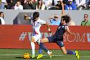 South Korea defender Kim Jin-Su (20) attempts to get by United States midfielder Mix Diskerud (8) during the first half of an international friendly soccer match in Carson, Calif., Saturday, Feb. 1, 2014. (AP Photo/Gus Ruelas)