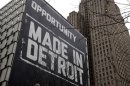 File photo of a large "Opportunity Made In Detroit" banner on the side of a building in downtown Detroit
