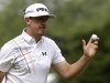 Hunter Mahan reacts after a putt on the first hole during the fourth round of the U.S. Open golf tournament at Merion Golf Club, Sunday, June 16, 2013, in Ardmore, Pa. (AP Photo/Morry Gash)