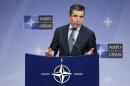 NATO Secretary General Rasmussen addresses a news conference during a NATO defence ministers meeting at the Alliance headquarters in Brussels