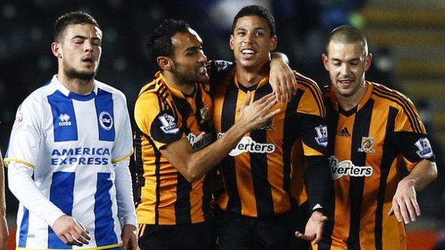 Hull City's Curtis Davies (2nd R) celebrates his goal against Brighton Hove Albion with Ahmed Elmonhamady (2nd L) and Matty Fryatt (R) (Reuters)