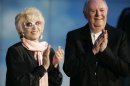 FILE - In this May 9, 2009 file photo Italian Nobel prize winner Dario Fo, right, and his wife Franca Rame applaud during the Italian State RAI TV program "Che Tempo che Fa", in Milan. Franca Rame has died in Milan, Wednesday, May 29, 2013. She was 84. (AP Photo/Antonio Calanni, File)
