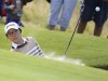 Ko of New Zealand plays her third shot from the bunker on the first hole during the second round of the British Women's Open Golf tournament in northern England