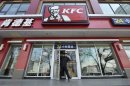 A man walks out from a KFC restaurant in Taiyuan