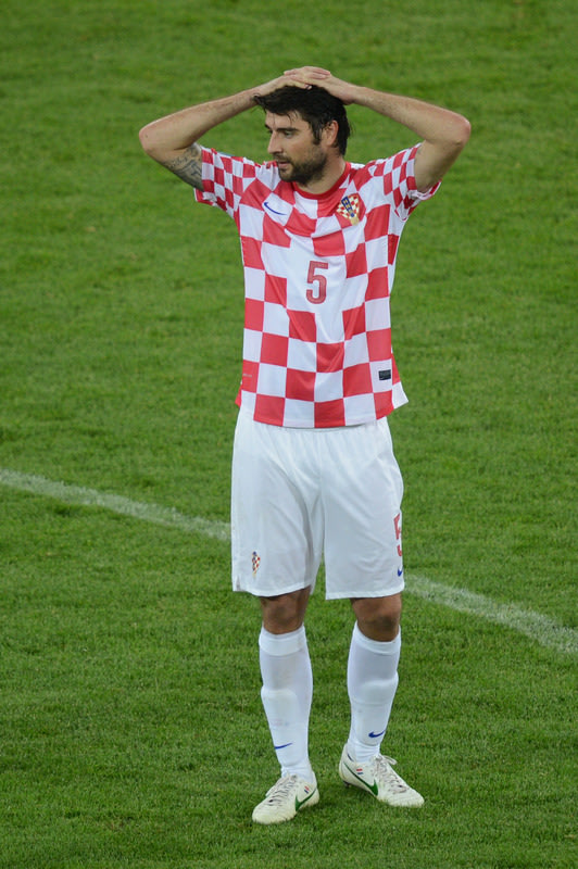 Croatian Defender Vedran Corluka  Reacts AFP/Getty Images