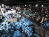 Clothes and sewing machines are seen in the Tazreen Fashions garment factory, where 112 workers died in a fire, in Savar