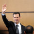 FILE - In this Monday, June 20, 2011 file photo released by the Syrian official news agency SANA, Syria's President, Bashar Assad waves to the audience after he delivers a speech in Damascus, Syria. Syrian President Bashar Assad warned against Western intervention in his country's 7-month-old uprising, saying such action would trigger an "earthquake" that "would burn the whole region."  (AP Photo/SANA, File) EDITORIAL USE ONLY