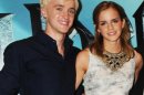 Tom Felton and Emma Watson smile during a photocall for 'Harry Potter And The Half-Blood Prince' at Claridge's Hotel in London on July 6, 2009 -- Getty Premium