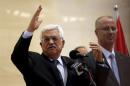 Palestinian President Mahmoud Abbas gestures as he speaks during the opening ceremony of a park in the West Bank city of Ramallah