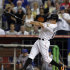 Miami Marlins' Adam Greensberg swings at the third strike against the New York Mets during the sixth inning of a baseball game in Miami, Tuesday, Oct. 2, 2012. (AP Photo/Alan Diaz)