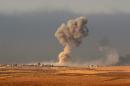 Smoke billows from an area near the Iraqi town of Bashiqa, some 25 kilometres north east of Mosul, during a Kurdish operation against the Islamic State (IS) on October 20, 2016, three days before Turkish forces say they hit IS targets nearby