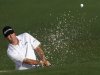 Ryan Palmer of the U.S. hits from a sand trap on the second green during first round play in the 2012 Masters Golf Tournament at the Augusta National Golf Club in Augusta