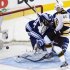 Boston Bruins forward David Krejci, right, scores past Toronto Maple Leafs goalie James Reimer, left, during the second period of Game 4 of their NHL hockey Stanley Cup playoff series, Wednesday, May 8, 2013, in Toronto. (AP Photo/The Canadian Press, Nathan Denette)