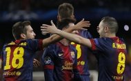 Barcelona players celebrate team's 4-0 victory during the Champions League round of 16 second leg soccer match between FC Barcelona and AC Milan at Camp Nou stadium, in Barcelona, Spain, Tuesday, March 12, 2013. (AP Photo/Daniel Ochoa de Olza)