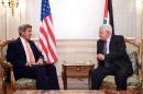 Palestinian leader Mahmud Abbas (R) meeting with US Secretary of State John Kerry in Paris on July 30, 2016
