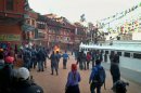 Nepalese policemen rush towards an exiled Tibetan Buddhist monk, center, who self immolated at Boudhanath Stupa in Katmandu, Nepal, Wednesday, Feb. 13, 2013. A police official says the Tibetan man has set himself on fire in Nepal's capital in what is believed to be the latest self-immolation to protest Chinese rule in Tibet. (AP Photo)