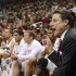Louisville head coach Rick Pitino, right, shouts instructions to his team during the first half of an NCAA college basketball game against Florida on Wednesday, Dec. 19, 2012, in Louisville, Ky. (AP Photo/Timothy D. Easley)