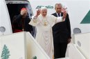 Pope Benedict XVI waves as he arrives at Beirut's airport