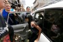 Alondra Diaz Garcia arrives for a court hearing in Los Reyes, Mexico, Tuesday, May 12, 2015. The teenage girl at the center of an international custody case won't be sent to the United States until Mexican authorities confirm her identity through DNA testing. The search for the 13-year-old attracted wide attention last month after a Mexican court erroneously sent another girl named Alondra to Texas in a case of mistaken identity. Dorotea Garcia, who lives in Houston, has been searching for her daughter since 2007 when the girl allegedly was taken into Mexico by her father. (Miguel Garcia Tinoco via AP)