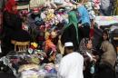 Women shop at Al Ataba market in Cairo