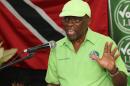 FILE - In this June 3, 2015 file photo, former FIFA vice president Jack Warner speaks at a political rally in Marabella, Trinidad and Tobago. A Trinidad judge has adjourned an extradition hearing for Warner until later this month. Warner's defense lawyer said Thursday, July 9, 2015, the hearing was adjourned because U.S. authorities have yet to send charges to Trinidad. A new hearing date of July 27 has been set. (AP Photo/Anthony Harris, File)