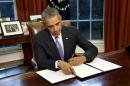 U.S. President Barack Obama vetoes H.R. 1735 "National Defense Authorization Act for Fiscal Year 2016" in the Oval Office of the White House in Washington