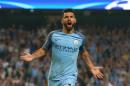 Manchester City's Sergio Aguero celebrates after scoring his sides 3rd goal of the game, and his hat-trick during the Champions League group C soccer match at the Etihad Stadium between Manchester City and Borussia Moenchengladbach in Manchester, England, Wednesday, Sept. 14, 2016. The match was rearranged from Tuesday due to adverse weather conditions in Manchester. (AP Photo/Dave Thompson)