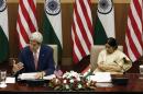 U.S. Secretary of State Kerry addresses the media as India's External Affairs Minister Swaraj looks on during their joint news conference New Delhi