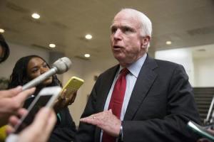 Senator John McCain (R-AZ) speaks to reporters after …