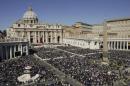 A view shows faithful gathering in St. Peter's Square as Pope Francis leads the Palm Sunday mass at the Vatican