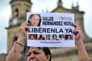 People demonstrate in Bogota on May 25, 2016 for the release of Spanish-Colombian journalist Salud Hernandez-Mora