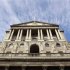 The Bank of England is seen against a blue sky in the City of London
