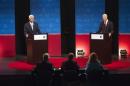 Former Florida Governor Charlie Crist and Florida Governor Rick Scott take part in a gubernatorial debate